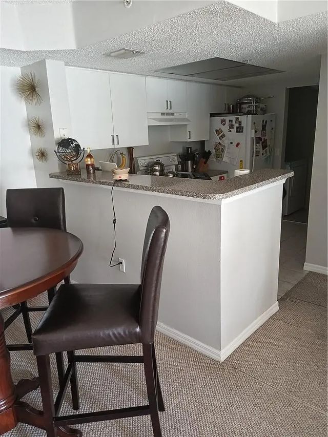 5 of 9 - 5051 Wiles Road #202, Coconut Creek, FL