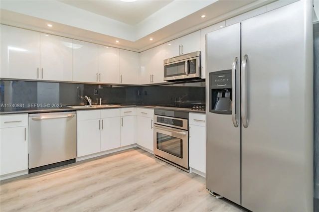 2 of 32 - 3530 Mystic Pointe Drive #1513, Aventura, FL