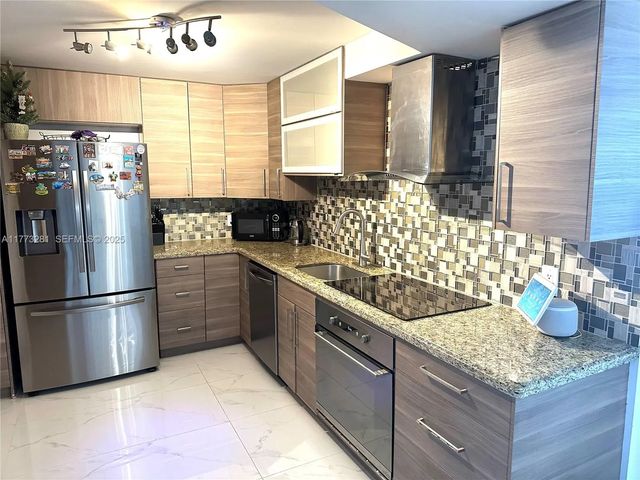 5 of 37 - 427 Golden Isles Drive #5g, Hallandale Beach, FL