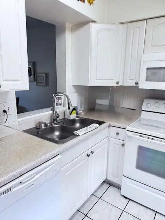 2 of 24 - 7320 Lake Circle Drive #407, Margate, FL