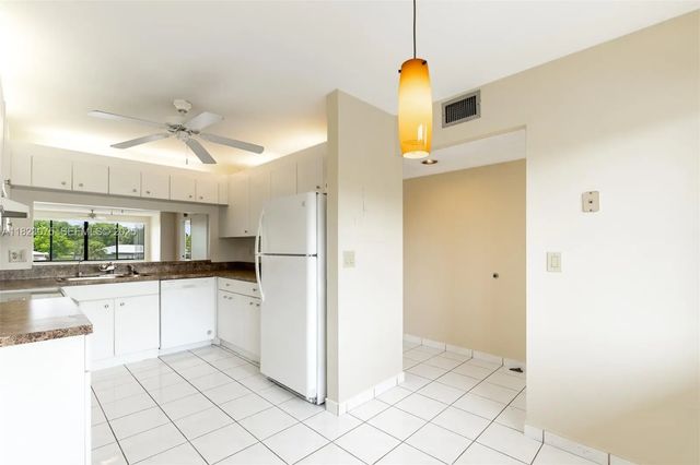 2 of 26 - 9455 N Belfort Circle #211, Tamarac, FL
