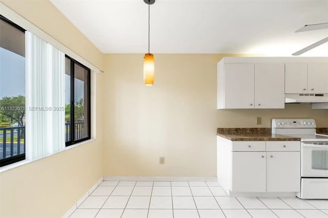 4 of 26 - 9455 N Belfort Circle #211, Tamarac, FL