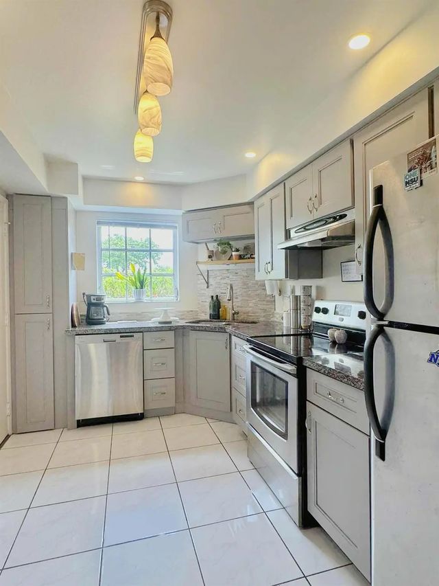 2 of 19 - 3475 Broken Woods Drive #101, Coral Springs, FL