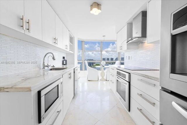 2 of 30 - 3500 Mystic Pointe Drive #2101, Aventura, FL
