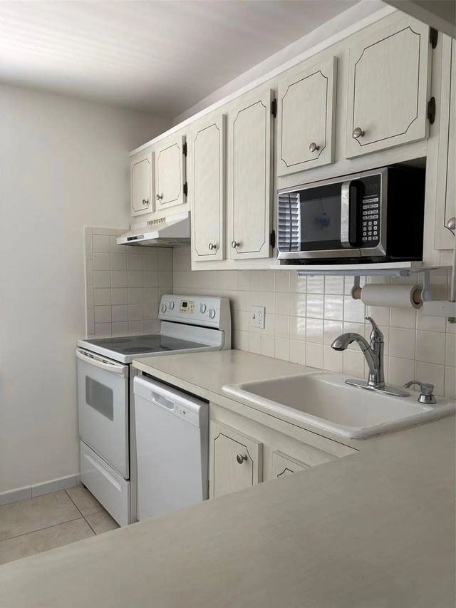 2 of 70 - 1055 Country Club Drive #404, Margate, FL