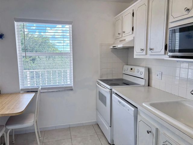 4 of 70 - 1055 Country Club Drive #404, Margate, FL