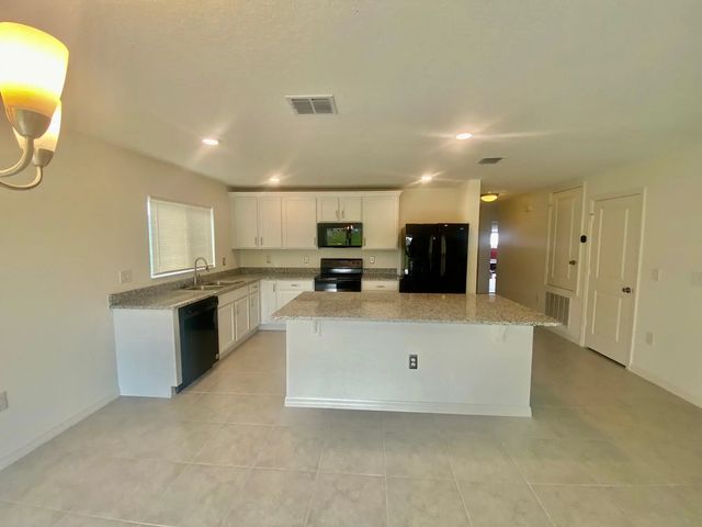 4 of 14 - 2460 Begonia Street, Mascotte, FL