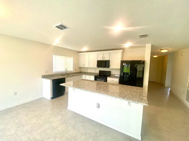 5 of 14 - 2460 Begonia Street, Mascotte, FL