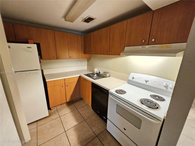 3 of 47 - 411 Executive Center Drive #209, West Palm Beach, FL