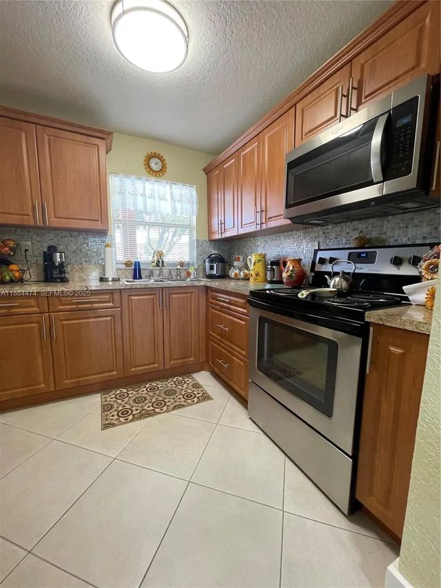 2 of 39 - 9041 Sunrise Lakes Boulevard #108, Sunrise, FL