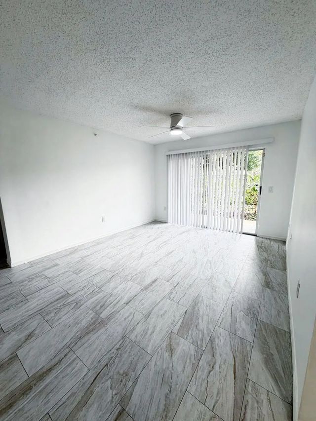 2 of 31 - 5025 Wiles Road #107, Coconut Creek, FL