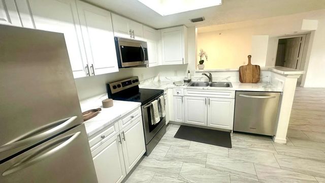 5 of 31 - 5025 Wiles Road #107, Coconut Creek, FL