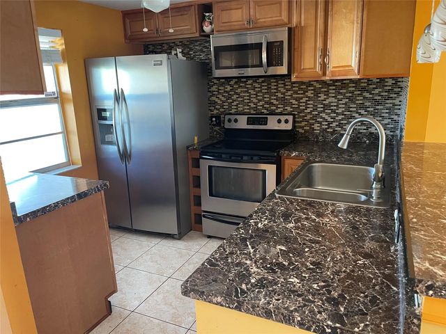 1025 Country Club Drive #407, Margate