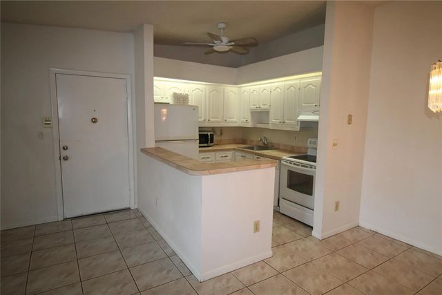 2 of 10 - 9728 S Belfort Circle #206, Tamarac, FL