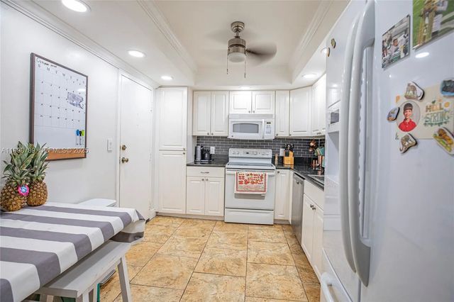 2 of 56 - 437 Golden Isles Drive #9b-c, Hallandale Beach, FL