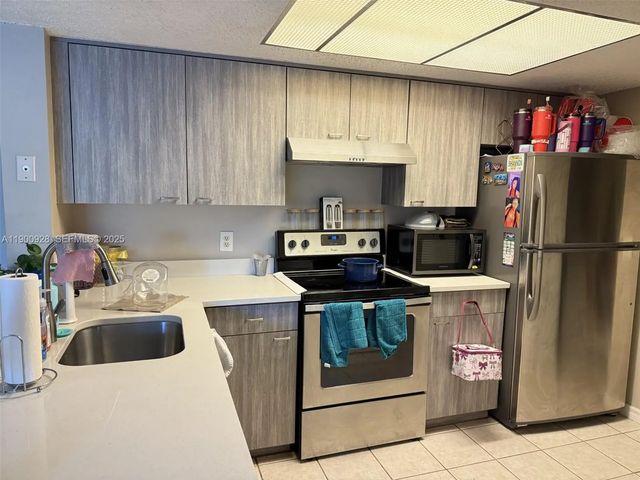 2 of 11 - 5015 Wiles Road #207, Coconut Creek, FL