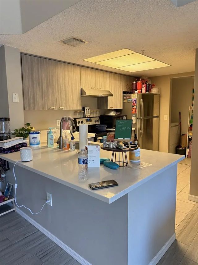 3 of 11 - 5015 Wiles Road #207, Coconut Creek, FL