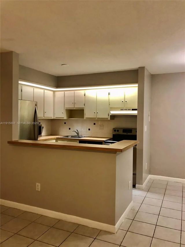 4 of 20 - 9753 W Mcnab Road #112, Tamarac, FL