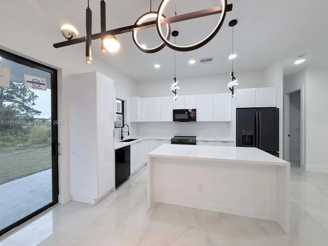 2 of 38 - 2614 45 Street W, Lehigh Acres, FL