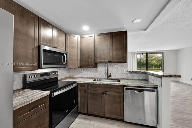 2 of 26 - 2850 Somerset Drive #105l, Lauderdale Lakes, FL