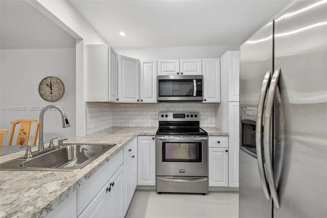 2 of 40 - 5000 Nw 36th Street #410, Lauderdale Lakes, FL