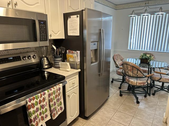 2 of 14 - 3138 Via Poinciana #114, Lake Worth, FL