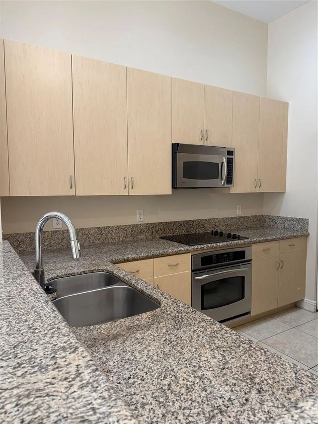 16102 Emerald Estates Drive #103, Weston
