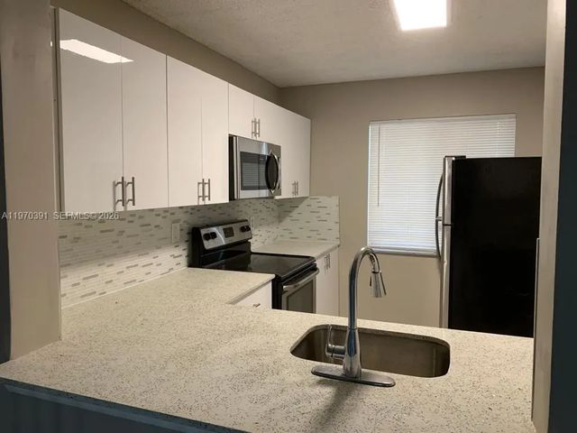 5 of 26 - 8700 N Sherman Circle #305, Miramar, FL