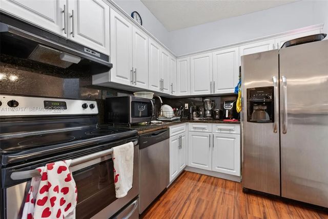 3 of 20 - 9748 S Belfort Circle #201, Tamarac, FL