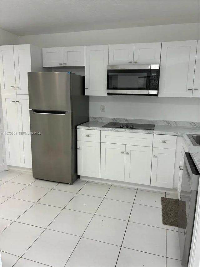 2 of 19 - 609 S State Road 7 #2c, Margate, FL