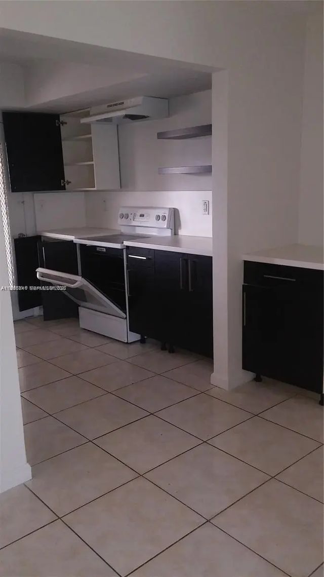 2 of 19 - 11840 Ne 19th Drive #27, North Miami, FL