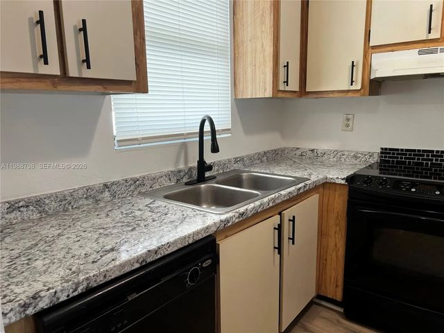 2 of 19 - 6001 Shakerwood Circle #204, Tamarac, FL