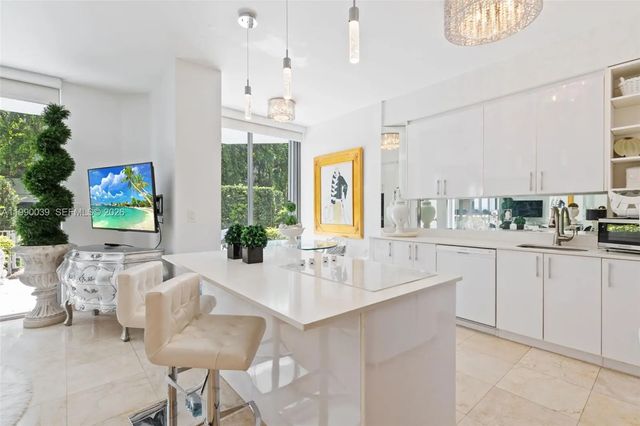 4 of 30 - 3530 Mystic Pointe Drive #114, Aventura, FL