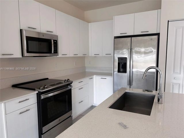 3 of 7 - 8001 Nw 41 Street #409, Doral, FL