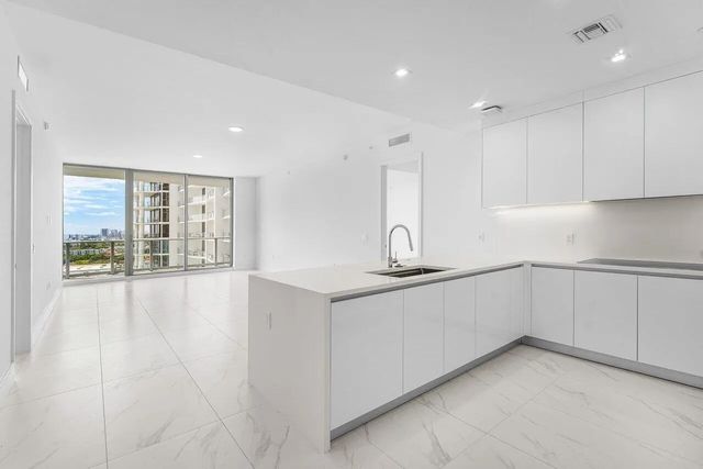 2 of 67 - 220 Lake Shore Drive #1415, Lake Park, FL