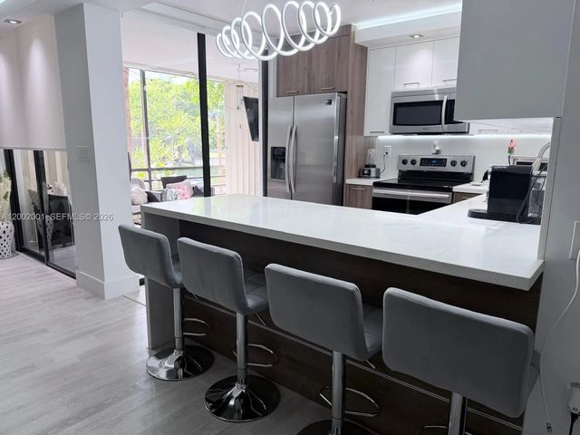 5 of 39 - 671 Ne 195th Street #208e, Miami, FL