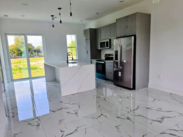 2 of 8 - 402 Harrison Drive, Lehigh Acres, FL