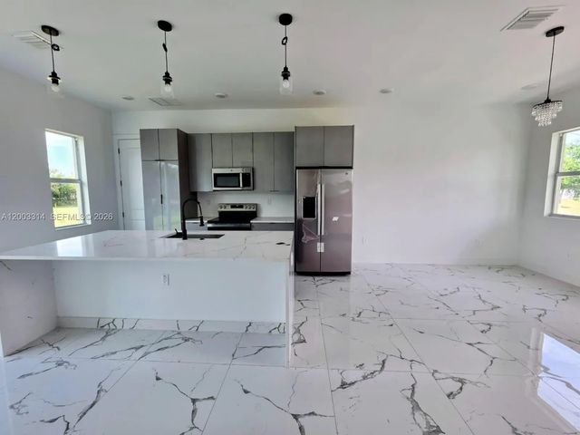 3 of 8 - 402 Harrison Drive, Lehigh Acres, FL