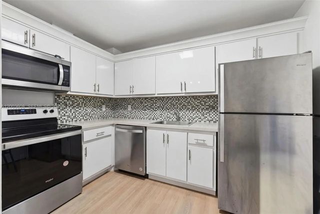 5 of 15 - 401 Golden Isles Drive #303, Hallandale Beach, FL