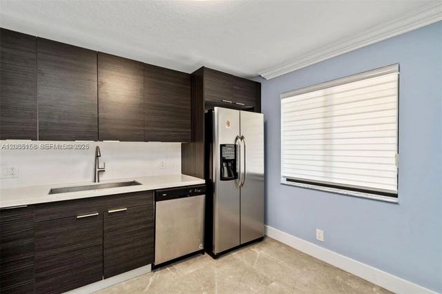 2 of 12 - 390 Racquet Club Road #202, Weston, FL