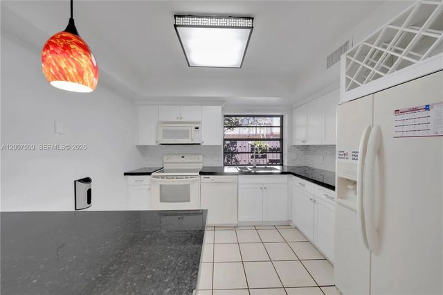 4 of 30 - 11435 Sw 133rd Court #64-4, Miami, FL