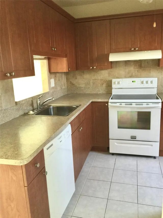 2 of 17 - 5041 W Oakland Park Boulevard #110, Lauderdale Lakes, FL