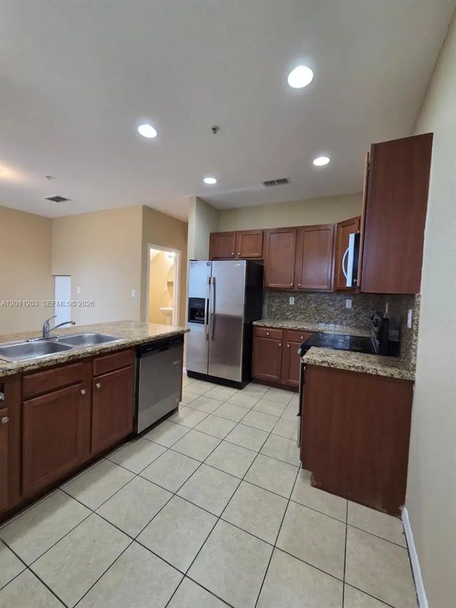 4 of 15 - 2851 W Prospect Road #404, Tamarac, FL