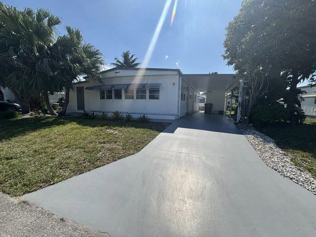 2 of 43 - 6445 Cypress Lane #377, Atlantis, FL