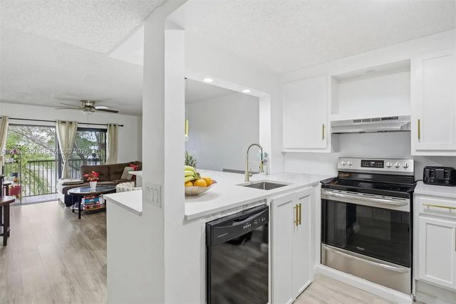 2 of 37 - 5501 Lakeside Drive #204, Margate, FL