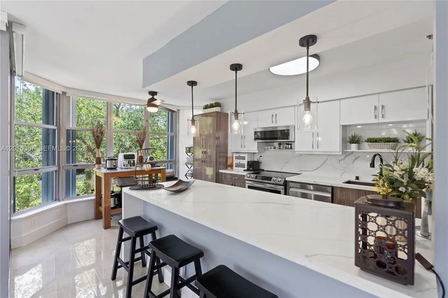 2 of 51 - 3600 Mystic Pointe Drive #306, Aventura, FL