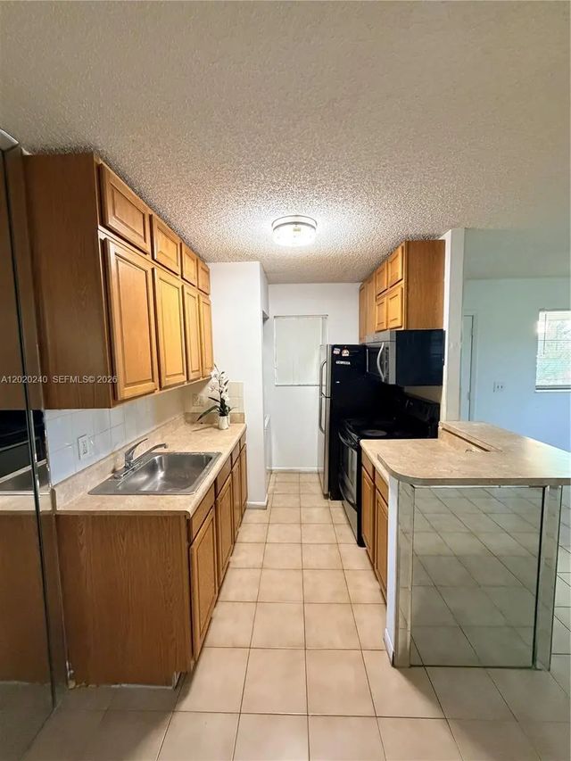 3 of 21 - 588 Trace Circle #202, Deerfield Beach, FL