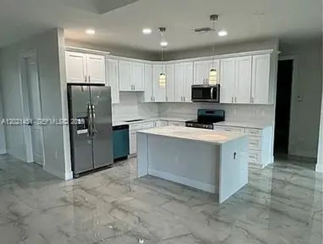 3 of 13 - 3304 11 Street W, Lehigh Acres, FL