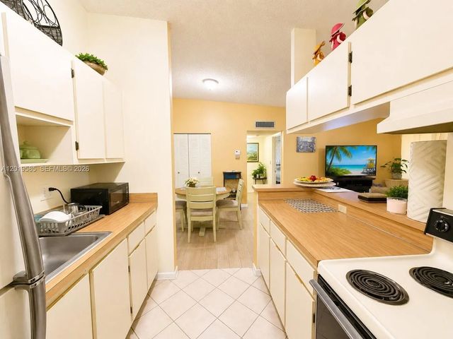 4 of 16 - 7837 Ashmont Circle #212, Tamarac, FL