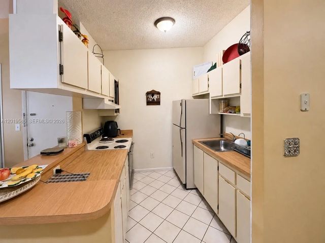 5 of 16 - 7837 Ashmont Circle #212, Tamarac, FL